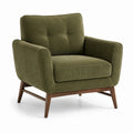 Poltrona in tessuto verde con struttura in legno